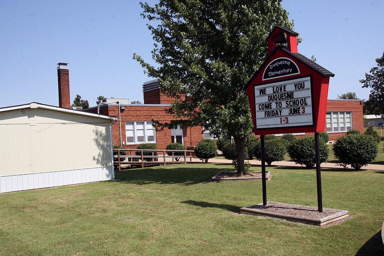 Duquesne, MO street scene near Joplin, where we provide hail damage roof repair